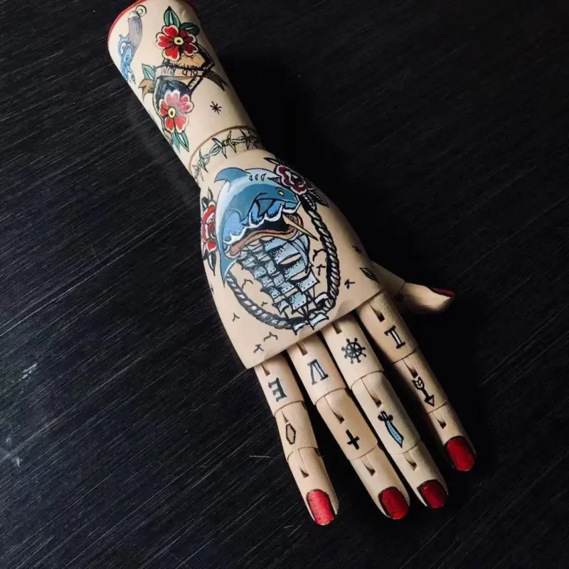 Tattooed mannequin handsornamentalliving simply house
