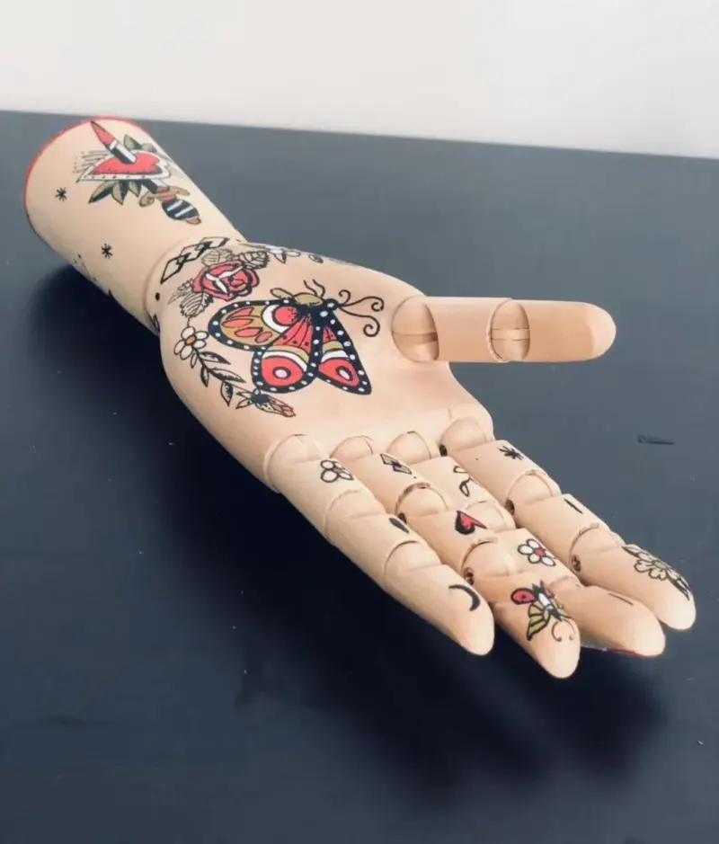 Tattooed mannequin handsornamentalliving simply house