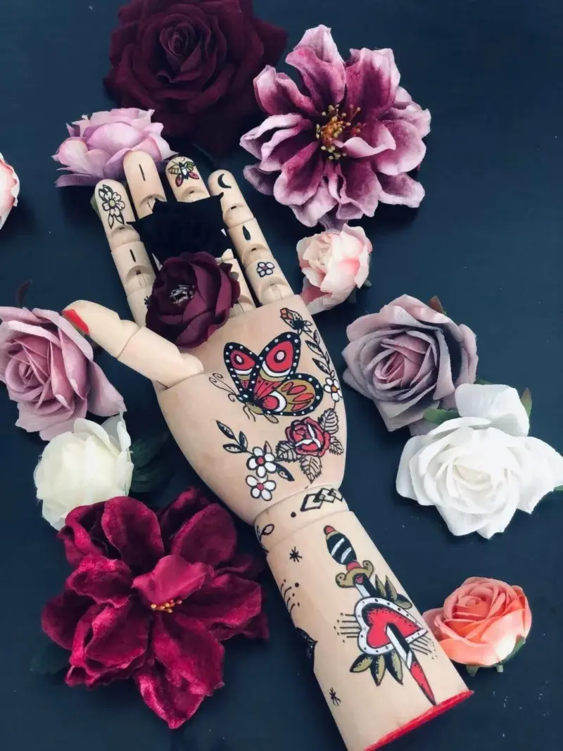 Tattooed mannequin handsornamentalliving simply house