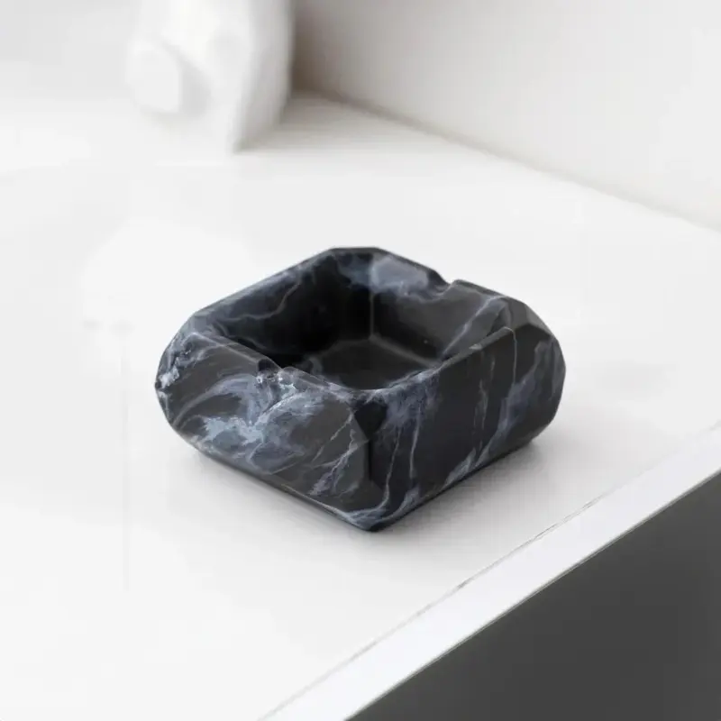 Textured marble effect ceramic ashtray