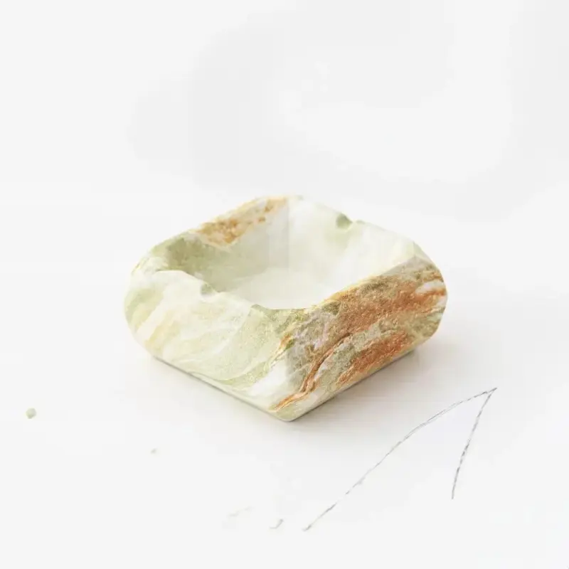 Textured marble effect ceramic ashtray