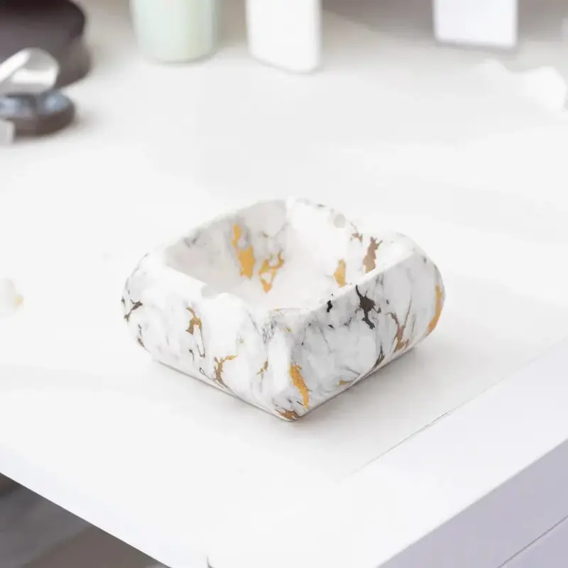 Textured marble effect ceramic ashtray