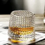 Textured ripple effect whisky glass