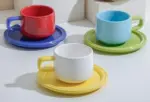 Three piece ceramic cups and saucers set