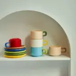 Three piece ceramic cups and saucers set