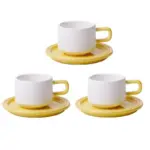 Three piece ceramic cups and saucers set