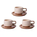 Three piece ceramic cups and saucers set
