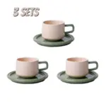 Three piece ceramic cups and saucers set