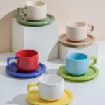 Three piece ceramic cups and saucers set