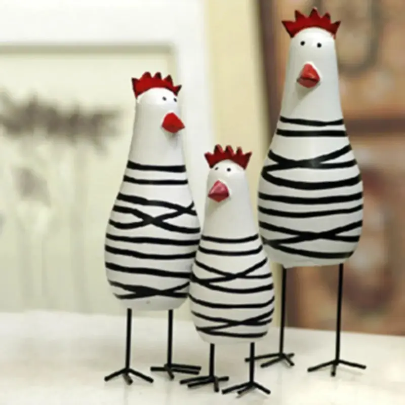 Three piece wooden rooster figurines set