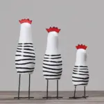 Three piece wooden rooster figurines set