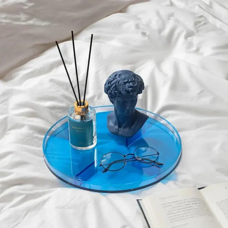 Translucent coloured round storage tray