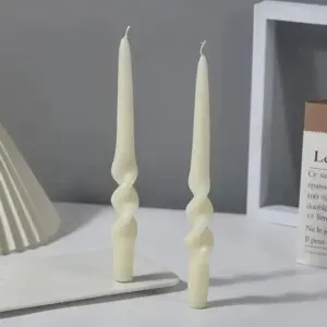 Two Pastel Coloured Household Candles