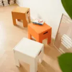 Versatile space age folding storage stool