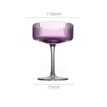 Vertical ribbed pattern purple glass