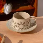Vintage coarse pottery coffee cup saucer set