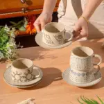 Vintage coarse pottery coffee cup saucer set