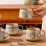 Vintage coarse pottery coffee cup saucer set
