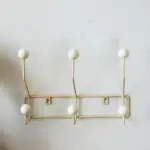 Vintage style coloured metal clothes hooks