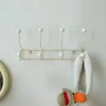 Vintage style coloured metal clothes hooks
