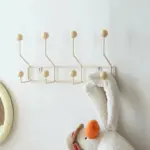 Vintage style coloured metal clothes hooks
