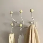 Vintage style coloured metal clothes hooks