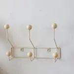 Vintage style coloured metal clothes hooks