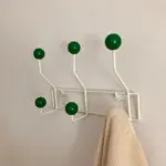 Vintage style coloured metal clothes hooks