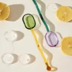 Wavey handled glass milk spoon