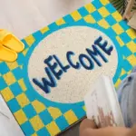 Welcome checkerboard printed doormat