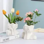 White ceramic shy girl decorative vase